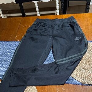 Adidas Mens Black Joggers with Gray Stripes, zipper pockets, tapered